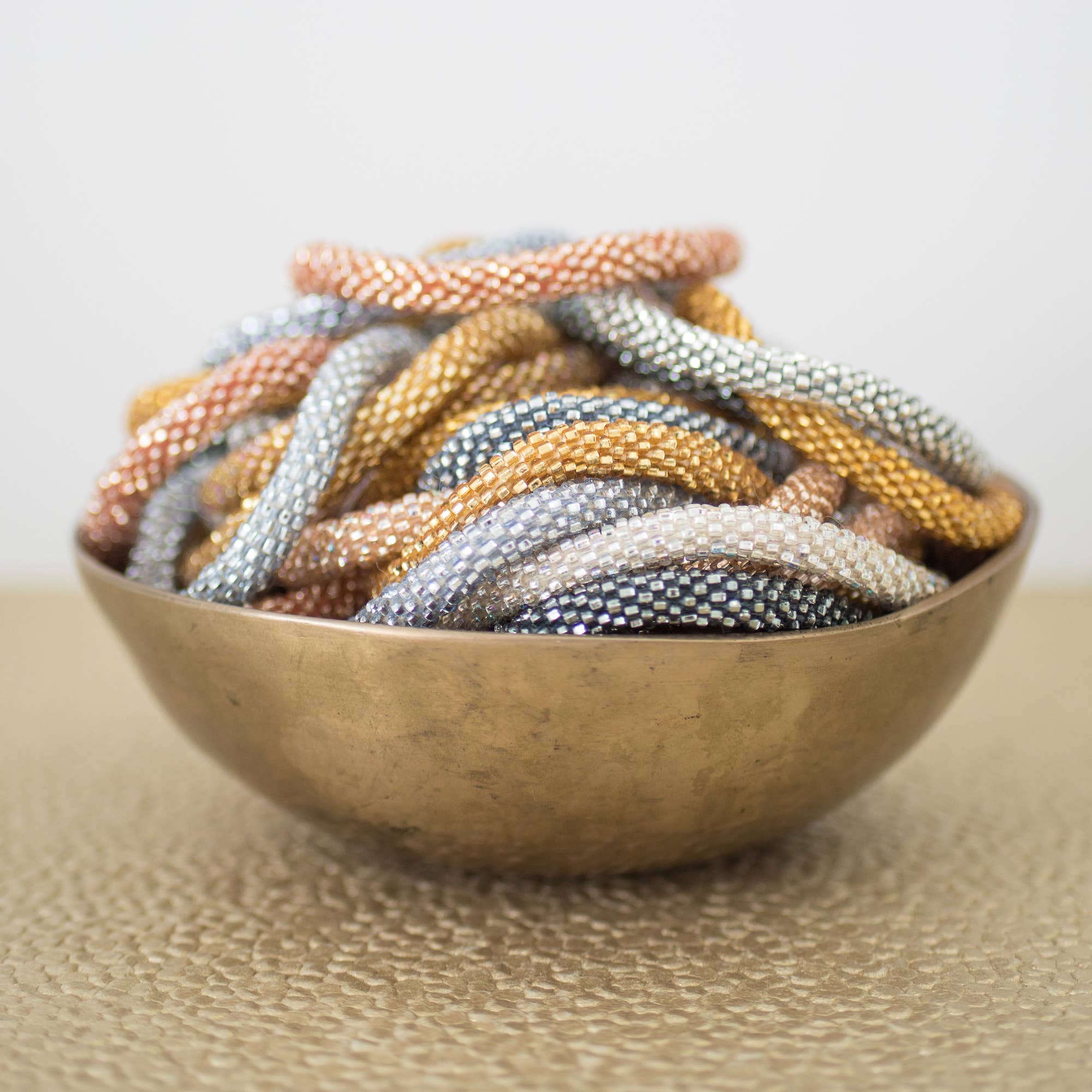 Roll-On® Bracelet – Handcrafted Nepal Bracelet | Glass Beads & Hand-Dyed Cotton